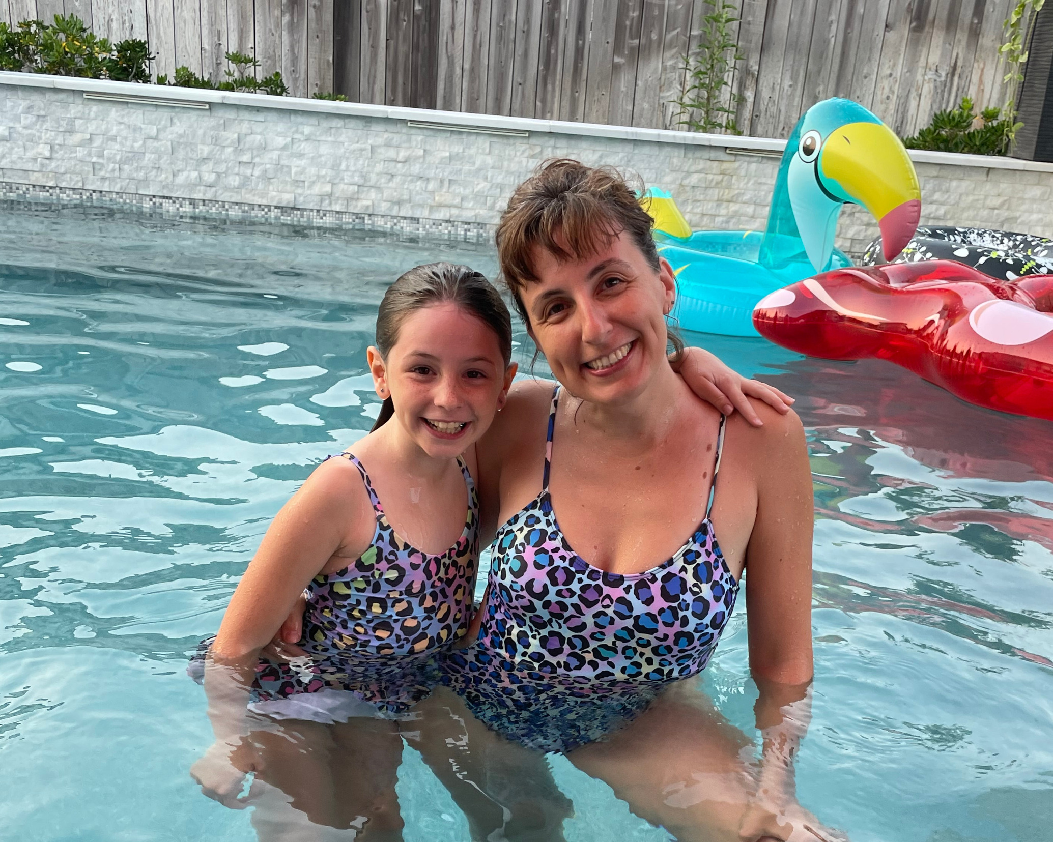 Kat and Lily together in the pool